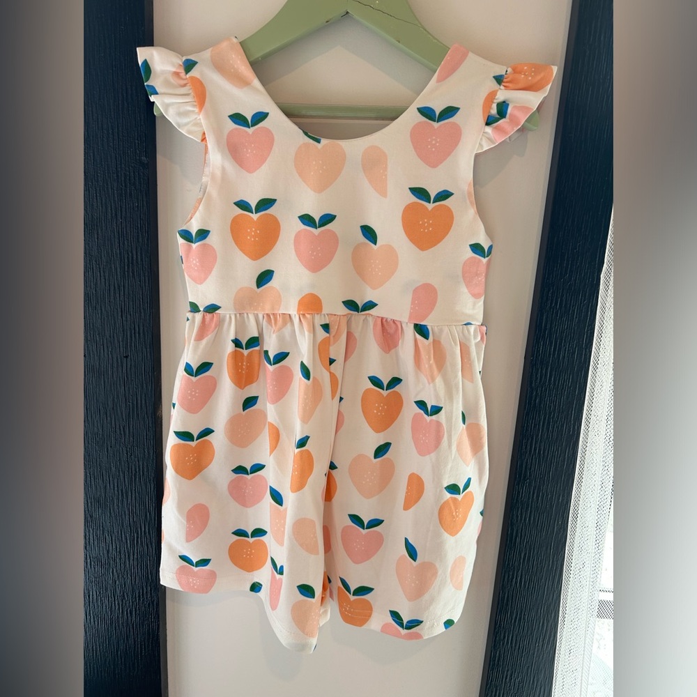 Bamboo Ruffle sleeve toddler romper in Peaches